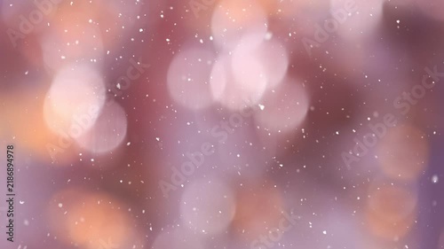 Abstract golden bokeh background with glowing lights and falling snow. Perfect for Christmas, New Year, winter holiday designs, wallpapers, banners and seasonal projects.