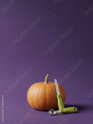 Minimalist pumpkin carving kit with safety tools on purple textured background with copy space