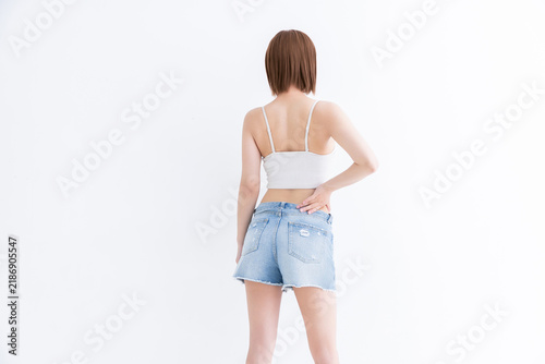 Plakat 健康的な若い女性の後ろ姿