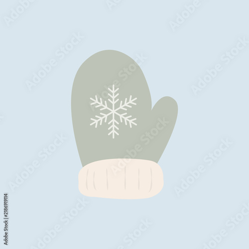 Winter comfort and holiday season concept, green mitten with white snowflake pattern for cold weather protection and festive Christmas celebration. Minimalist flat illustration of a cozy knitted.