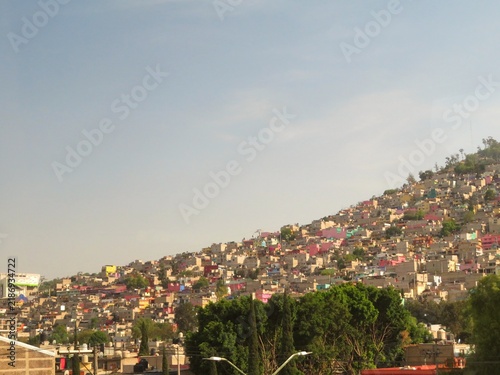 Quadro su tela colorful slums on the hill in Ecatepec, Mexico city