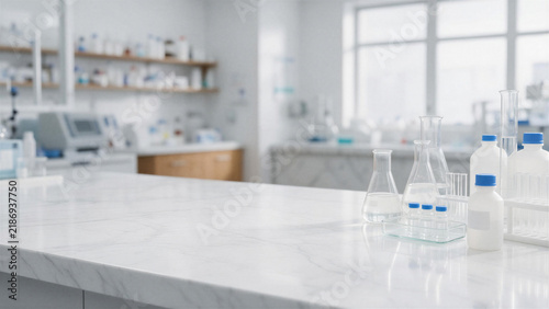 Modern Empty Marble Laboratory Countertop with Glassware and Blurred Scientific Research Facility Background