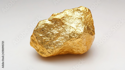 Shiny gold nugget with rough texture, symbolizing wealth and investment opportunities