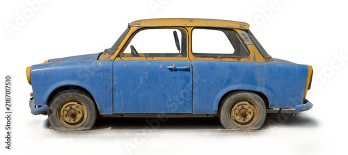 Rusty Blue And Yellow Vintage Car With Flat Tires Side View On Black Background