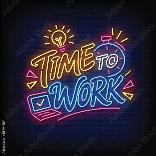 Colorful Neon “Time to Work” Sign with Laptop and Clock on Dark Brick Wall