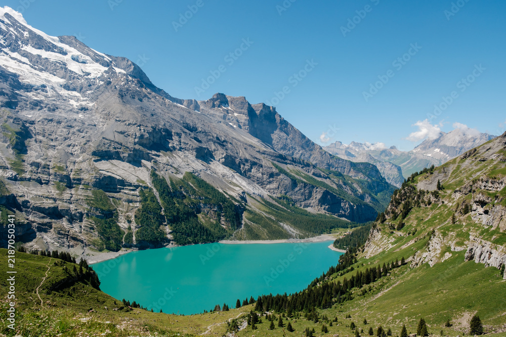 Fototapeta premium Discover the breathtaking beauty of Oeschinensee in Kandersteg, Switzerland