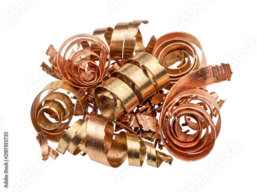 Copper shavings brass metallic swarf lathe turning scrap pile on black background for industrial manufacturing engineering metalworking recycling concept hardware texture detail isolated metallurgy wo