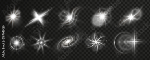 Фотография White twinkle flare with radiant light effect and glowing star burst