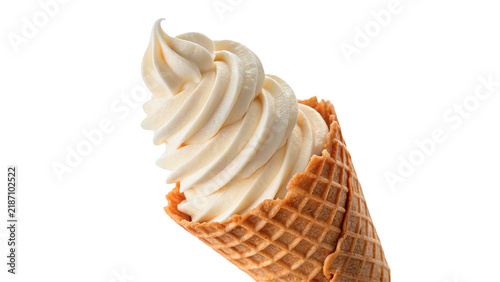 Classic waffle cone filled with creamy vanilla soft serve ice cream isolated on transparent background