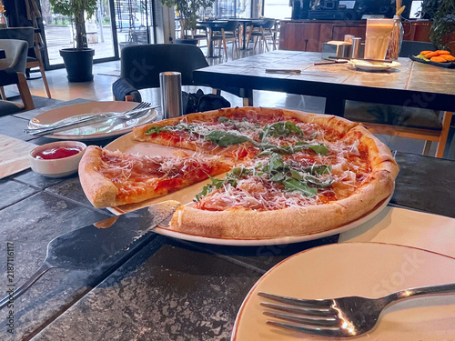 slice pizza on the table in cafe