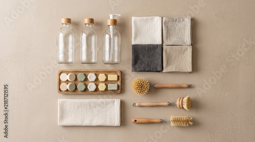 Sustainable zero waste cleaning kit, eco-friendly bamboo brushes and glass bottles, natural household supplies for plastic-free living