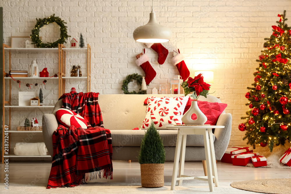 Fototapeta premium Christmas home interior, cozy living room with decorated tree and festive holiday decor for winter seasonal celebration and family gathering atmosphere