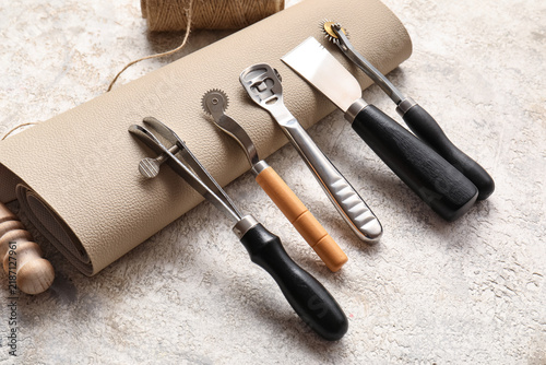 Картината върху платно Leathercraft and artisan hobby, professional leather working tools and material