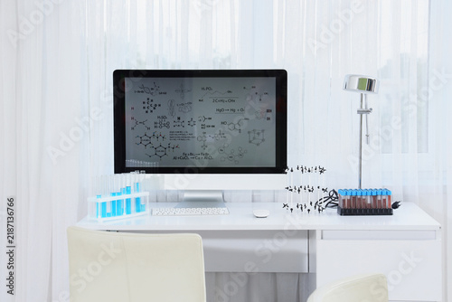 Scientific research and chemical education, computer monitor with chemistry f...
