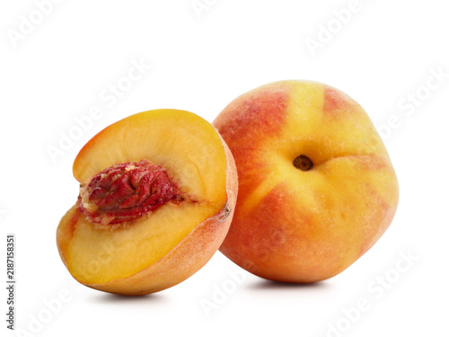 Fotografie Sweet ripe peaches on white background