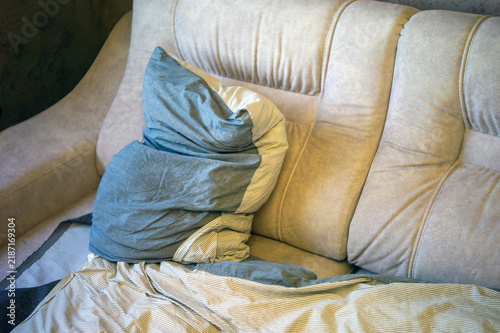 old sagging sofa
