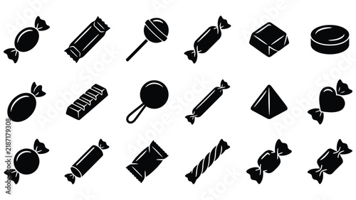 Collection of black candy and confectionery on white background