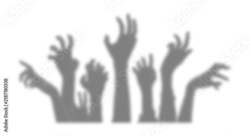 Spooky zombie hands rising up silhouette for Halloween