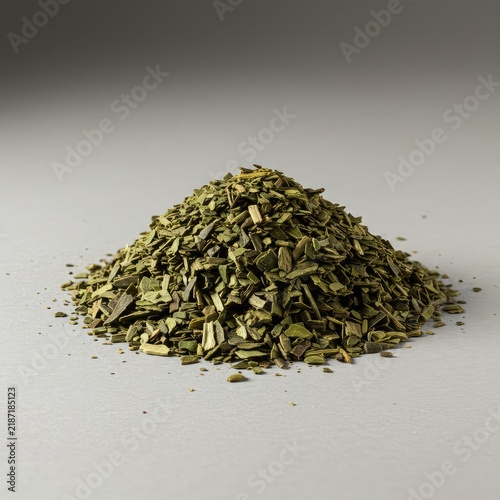 Heap of dried, unsmoked green mate leaves used to prepare a caffeine rich herbal infusion beverage known for its natural energy ,diet ,brewing ,infusion