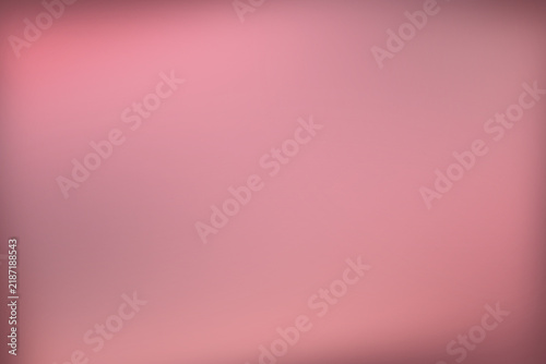 Soft pink gradient background with a blurred texture for digital design projects
