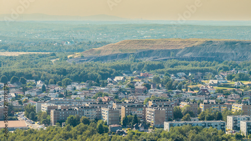 Fotografie Urban landscape showing residential buildings and houses contrasting with an ind