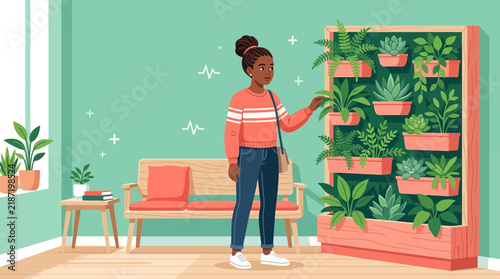 Young Woman Tending to Vertical Indoor Garden