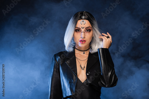 Bild auf Leinwand Gothic witch enchantress showcasing Halloween spirit with stunning makeup