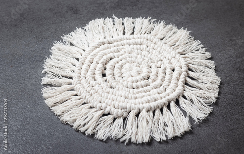 Konstfotografi White macrame decorative item with fringe details, finished handicraft