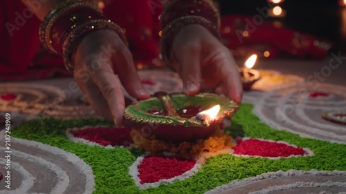 Clay diya lamps lit during diwali celebration, Diwali, or Deepavali, is India's biggest and most important holiday.