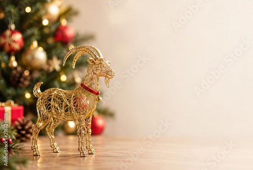 Christmas Gifts with Golden Goat Decoration on a Table, 2027 New Year