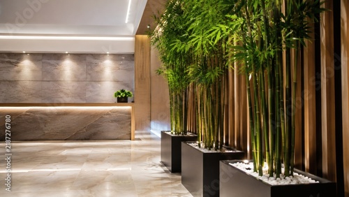 Modern lobby with bamboo plants and warm lighting