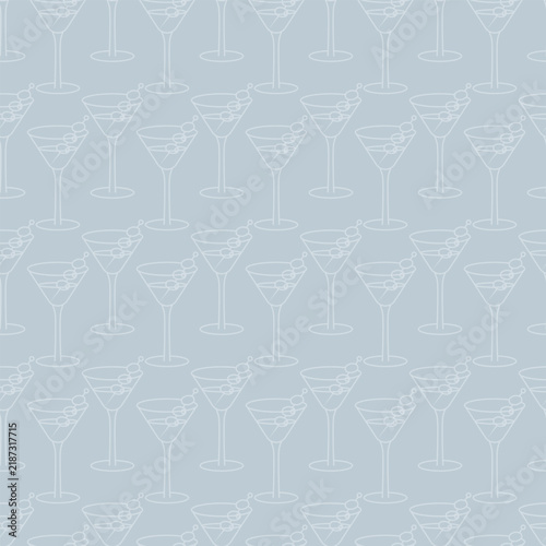 Martini garnished with olives on a skewer. The glasses on the print are arranged in a zigzag pattern. Endless vector pattern. Repeating background of glasses with aperitifs and canapes. 