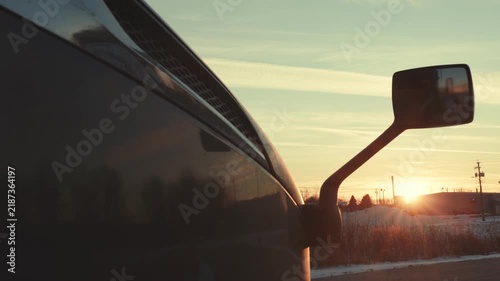 Close-up of a semi truck cab at sunset