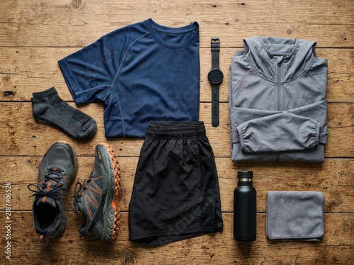 Flat lay of athletic clothing and accessories for a workout session 1.