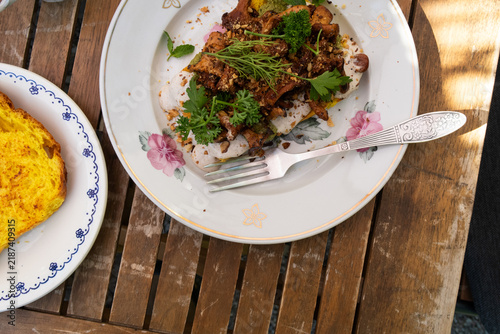 toast with mushrooms with sauce and herbs