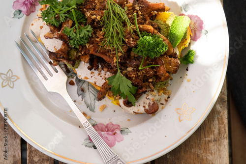 toast with mushrooms with sauce and herbs