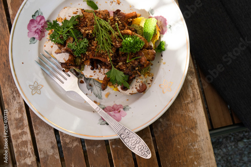 toast with mushrooms with sauce and herbs