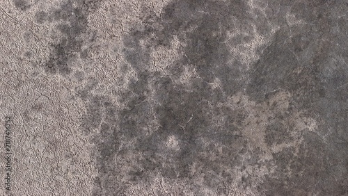 Aerial view of the dry, cracked earth texture of the dried-up bed of Little Gaynor Lake in Longmont, Colorado, United States.