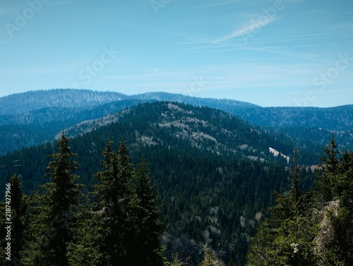 Zlatar, Serbia, a natural rural landscape. View of the mountains with a spruce forest in spring in April. Ethno tourism in the Balkans. Balkan Range, Zlatar. Suburb of Nova Varosh, National Park.
