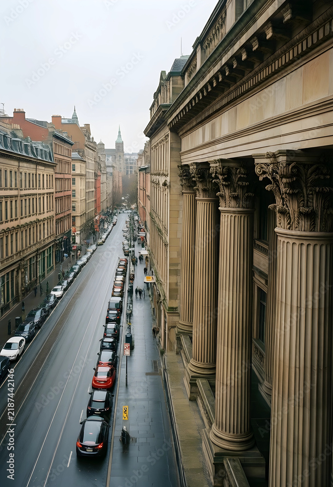 Obraz premium Urban infrastructure and city development, historic architecture with classical columns lining a busy street with parked cars and commuters in a city center