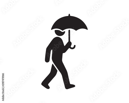 Man with umbrella walking in the rain black silhouette