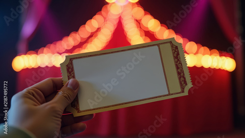 Blank Circus Ticket in Hand. Circus Entrance Ticket Close Up. Colorful Circus Entrance. Family Entertainment Ticket. Carnival Admission Concept. Circus Event Access