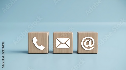 Wooden Blocks Displaying Communication Symbols for Business Contact Information and Customer Support Services