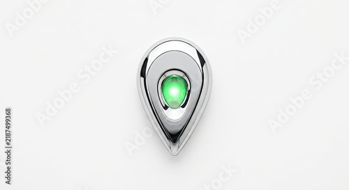 Silver teardrop pendant with glowing green gem.