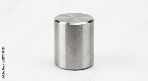 Solid stainless steel cylindrical weight on white background.