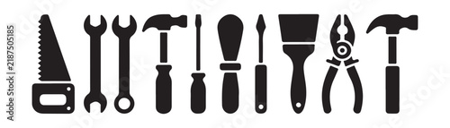 Construction tools collection including hammer screwdriver wrench saw and pliers for repair.