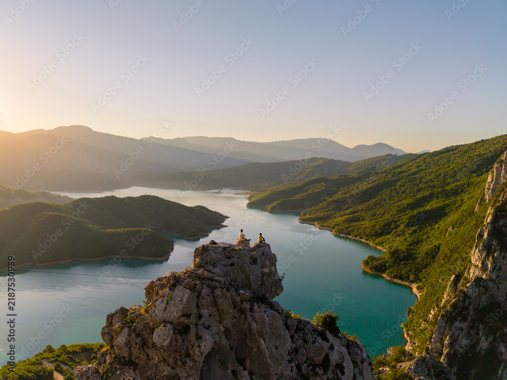 Fototapeta premium Stunning view from the cliffs overlooking Bovilla Reservoir in Albania during sunset