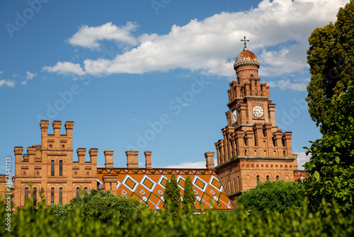 Clock tower. On a blue sky background. Selective focus.