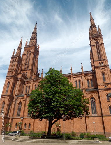 Marktkirche framed by urban greenery in Wiesbaden, Germany