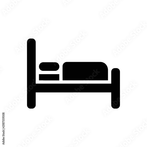 Simple black icon of a bed with pillow and blanket, isolated on white background.
